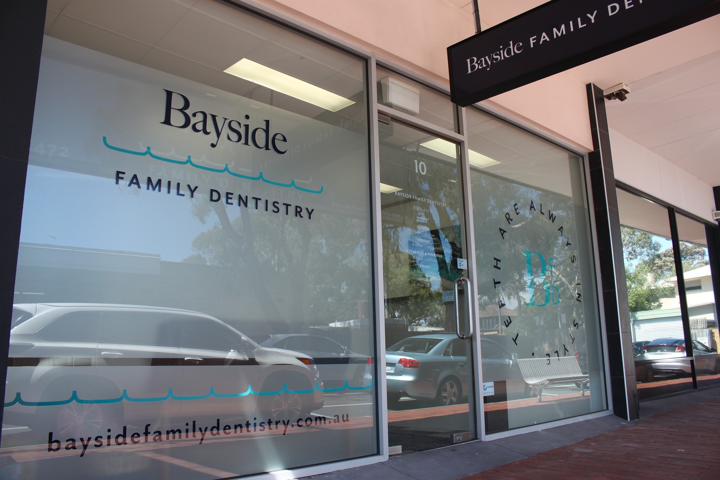 Teeth are always in style, on our front window